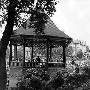 Rugby Town Band playing in Caldecott Park, Rugby. 8th June 1958
