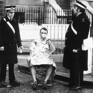 Runner in the London Marathon March 1981 being helped by members of the St Runner in the London Marathon March 1981 being helped by members of the St
