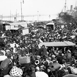 The rush of civilians to the quay at Antwerp to catch one of the boats evacuating