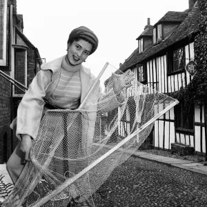 At Rye, the quaint old Sussex Cinque Port fishing nets in great variety are made At Rye, the quaint old Sussex Cinque Port fishing nets in great variety are made