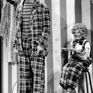 Two sad looking circus clowns, an adult and a young child. 26th September 1983 Two sad looking circus clowns, an adult and a young child. 26th September 1983