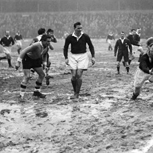 The safe hands of Syddall ( Swinton) gather the ball during a rugby league match taking