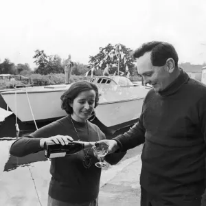 Print of Sailor Donald Crowhurst with champagne after yacht launch Print of Sailor Donald Crowhurst with champagne after yacht launch