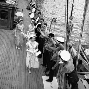 Sailors greet women on the deck of the sailing ship Creole at Dartmouth Sailors greet women on the deck of the sailing ship Creole at Dartmouth