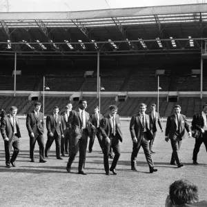 Salford Red Devils rugby league team members inspect the pitch at Wembley Stadium ahead