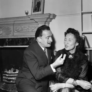 Salvador Dali is to paint a portrait of Sir Laurence Olivier. Dali with his wife Gala