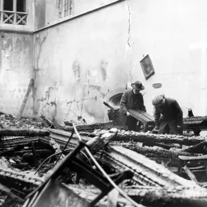 Salvaging furniture from a Cardiff Church after the raid by Nazi planes. Circa 1941 Salvaging furniture from a Cardiff Church after the raid by Nazi planes. Circa 1941