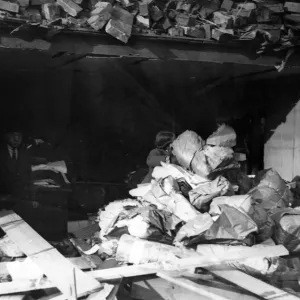 Salvaging stock in Canton, Cardiff, following a Nazi air raid. Circa 1941 Salvaging stock in Canton, Cardiff, following a Nazi air raid. Circa 1941