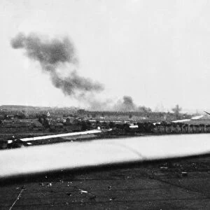 A salvo of bombs bursting on the concrete runway of Schipol Aerodrome, Amsterdam