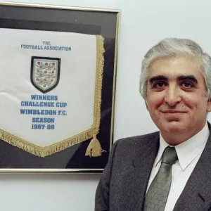 Sam Hammam, Wimbledon chairman, stands proudly with the 1988 FA Cup award Sam Hammam, Wimbledon chairman, stands proudly with the 1988 FA Cup award