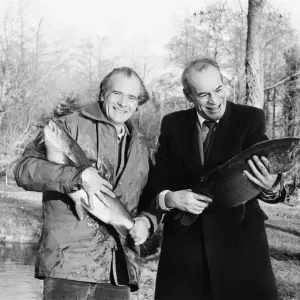 Sam Holland (left), trout farmer with James Pettigrew, hold some of the outsize trout Sam Holland (left), trout farmer with James Pettigrew, hold some of the outsize trout