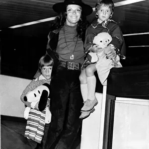 Samantha Eggar actress with her children Nicholas and Jenna arriving at Heathrow