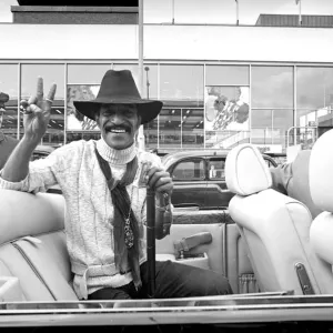Sammy Davis Jnr in his new Rolls-Royce convertible at Heathrow Sammy Davis Jnr in his new Rolls-Royce convertible at Heathrow