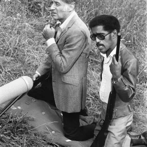 Sammy Davis Junior and Peter Lawford whilst on location at Eastnor Castle, Ledbury Sammy Davis Junior and Peter Lawford whilst on location at Eastnor Castle, Ledbury