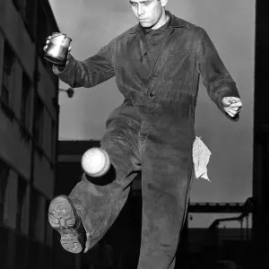 Sammy Reid playing football at work January 1967 Sammy Reid playing football at work January 1967