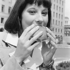 Sandwich Feature, Manchester, 21st August 1974. Young woman takes a lunch break Sandwich Feature, Manchester, 21st August 1974. Young woman takes a lunch break