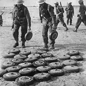 Sappers of a South African Division clearing and making safe enemy mines in the Bardia