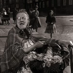 Sarah Burke aged 78 Flower Seller - February 1961 sells flowers on the streets of