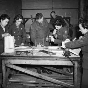 Sawing and hammering away like veterans, a cluster of ATS girls