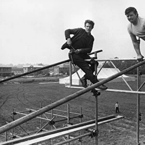 Scaffolding erectors Martin Costello left and Fred Beasley at work on the stage for