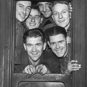 Scenes on an army train taking troops back to the front after being on leave during