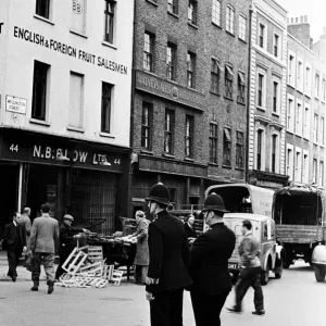 Scenes at Covent Garden, central London on the corner of Wellington Street with two