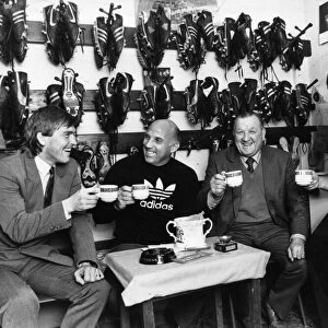 Scenes inside the famous boot room at Anfield. Left to right are