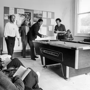 Scenes inside Norton house showing people playing pool in the games room