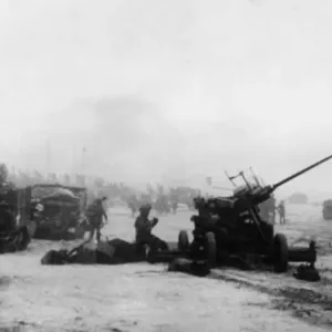 Scenes on a Normandy beachhead as crack British troops made their first landing Scenes on a Normandy beachhead as crack British troops made their first landing