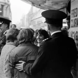Scenes at The Prince of Wales Theatre in London when The Beatles arrived at the front