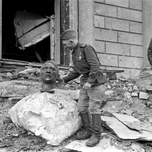 Scenes at the Reichstag in Berlin showing a Russian soldier of the Red Army Scenes at the Reichstag in Berlin showing a Russian soldier of the Red Army