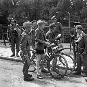 Scenes showing children talking to occupying soldiers in Berlin as the British Army