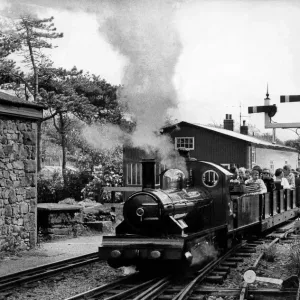 One of the scheduled services sets off on the Eskdale miniature railway on 26 May 1976 One of the scheduled services sets off on the Eskdale miniature railway on 26 May 1976
