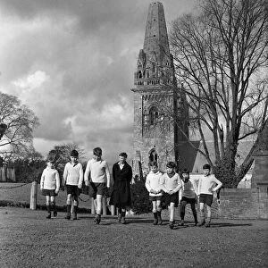Scholars and choirboys of Llandaff Cathedral, South Wales, on their way to play rugby