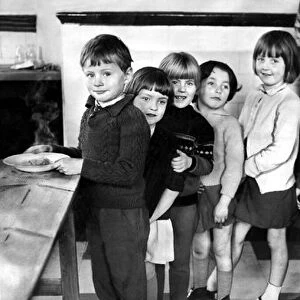 School children at Laygate Lane Junior Mixed School, South Shields line up for lunch
