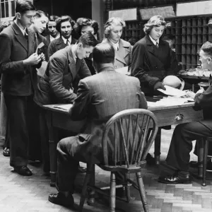 Schoolboys and girls enrolling for Post Office work in Reading. 15th December 1942 Schoolboys and girls enrolling for Post Office work in Reading. 15th December 1942