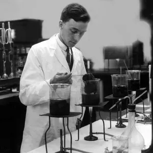 Science Bunsen Burner August 1926 A chemist testing dyes on woollen material in Science Bunsen Burner August 1926 A chemist testing dyes on woollen material in