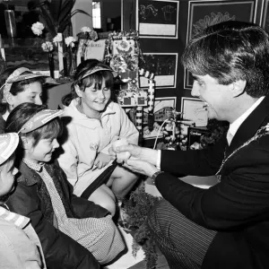 Science is fun... Kirklees Mayor Clr Tom Oonovan shows a chick to a group of children