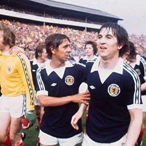 Scotland footballers Tom Forsyth and goalkeeper Alan Rough celebrate victory over England