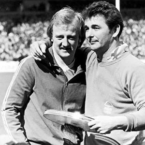 Scottish footballer Kenny Burns of Nottingham Forest with manager Brian Clough