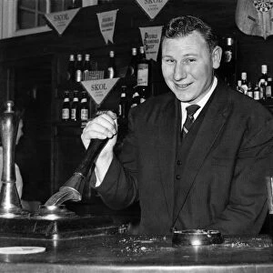 Former Scottish international goalkeeper Tommy Younger keeps fit pulling pints in his