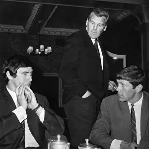Scottish them Manager John Prentice (Standing) has a chat with Jim Baxter (left