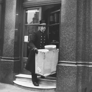 A Scotts the Hatter delivery man seen here dressed in full dress uniform A Scotts the Hatter delivery man seen here dressed in full dress uniform