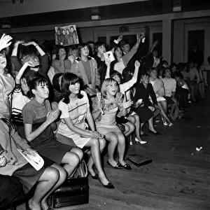 Screaming girl fans greet the Beatles last night on their appearance in Leicester