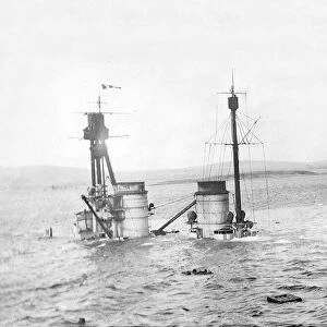Scuttled German fleet sinks into sea at scapa Flow WWI in Scotland