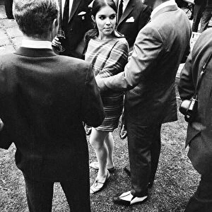 Sean Connery and actress Vivienne Ventura talks to England footballers left to right