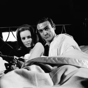 Sean Connery and Luciana Paluzzi on set, 16th March 1965 print Sean Connery and Luciana Paluzzi on set, 16th March 1965 print