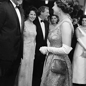 Sean Connery meets Queen Elizabeth II at the premiere of the new James Bond film
