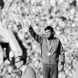 Sebastian Coe acknowledges crowd during medal ceremony after Mens 1500 metres final