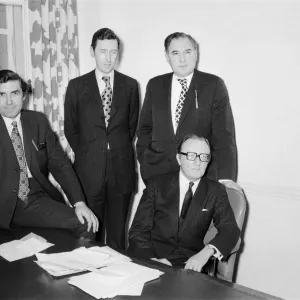A black and white photograph print of Lord Carrington at his desk A black and white photograph print of Lord Carrington at his desk
